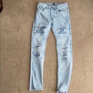 light blue ripped jeans